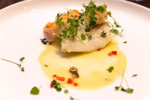 Earth and Ocean dish at Chino Latino: Turbot, Prawns, Edamame Nage, Lemon Thyme, Shimeji