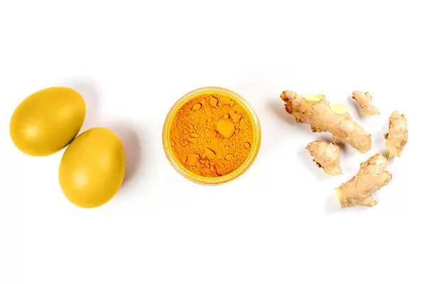 Easter eggs colored naturally with ingredients - turmeric and ginger
