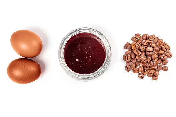 Easter eggs dyeing with coffee, top view