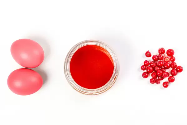 Easter eggs painted with natural dye from fruits red currant