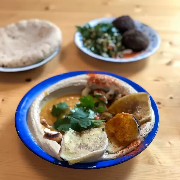 Eggplant with spicy mango tamarind, ginger sauce and a pinch of chili