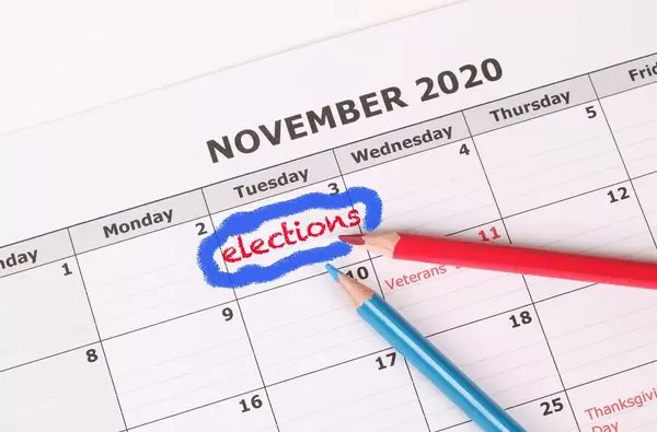 Elections reminder in calendar with red and blue pen