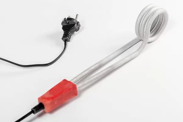 Electric device for heating water on a white background (Flip 2019)
