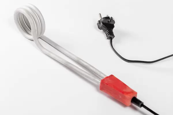 Electric device for heating water on a white background