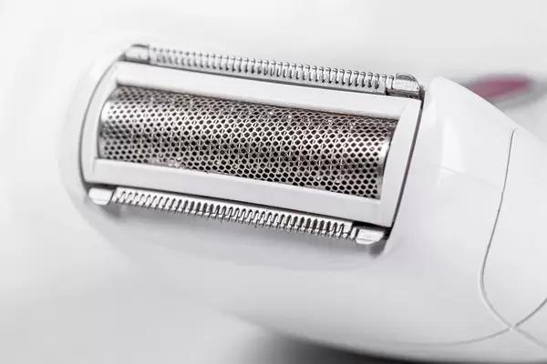 Electric female epilator with a haircut attachment