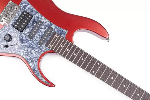 Electric Guitar above white background