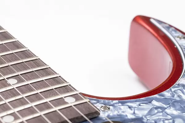 Electric Guitar and music concept with white background copy space