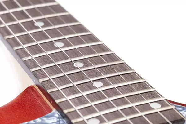 Electric Guitar Frets on the neck closeup