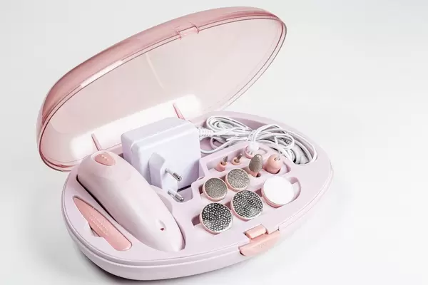 Electric professional nail manicure and pedicure machine on white