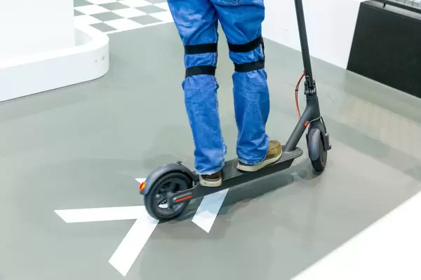Electric Scooter indoor test: Man drives the MI E-Scooter by Xiaomi