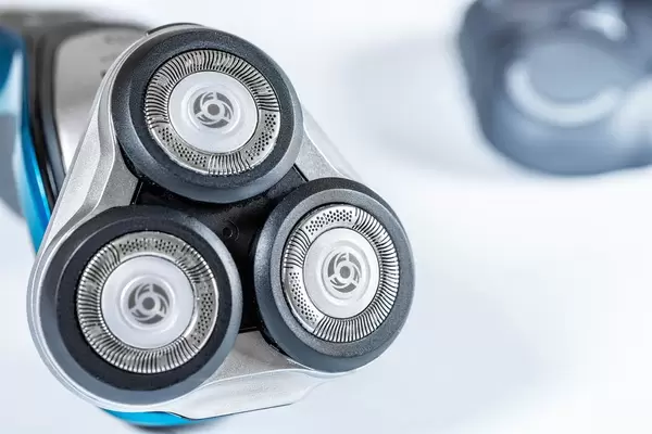 Electric shaver closeup on white background  Flip 2019