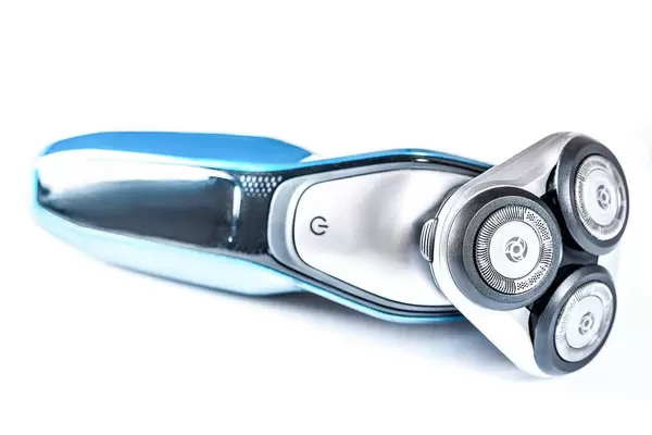 Electric shaver on white