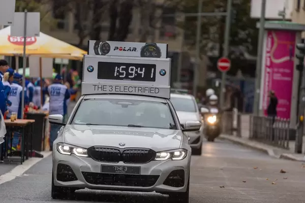 Electrified BMW model 3 as timing car shortly before the magical two-hour point