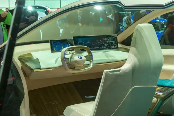 Electro mobility and designer drivers seat and simple interior of the futuristic electric car BMW Vision iNext