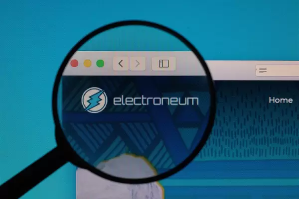 Electroneum logo under magnifying glass
