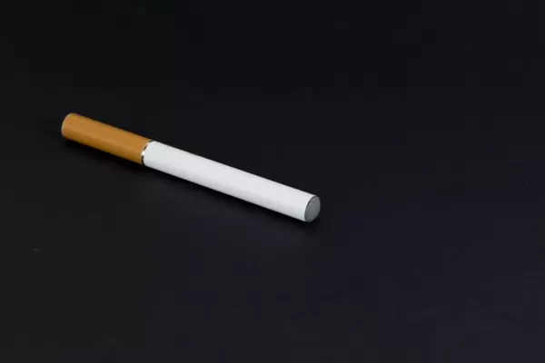 Electronic cigarette on black background