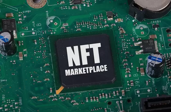 Electronic circuit board with NFT Marketplace text