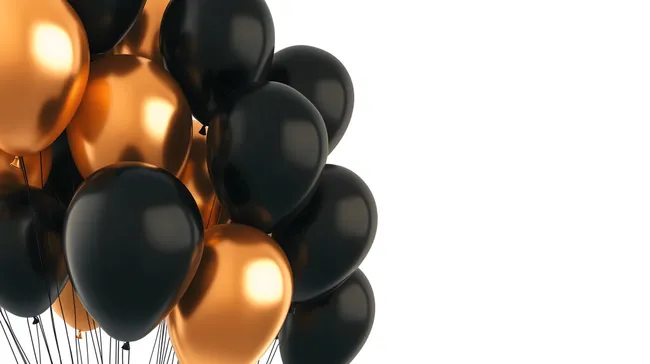Elegante schwarze und goldene Ballons auf weißem Hintergrund