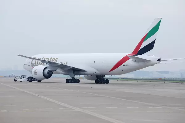 Emirates SkyCargo plane baing towed