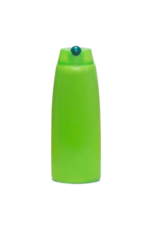 Empty shampoo plastic bottle isolated on white background