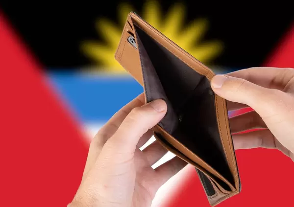 Empty Wallet with Flag of Antigua and Barbuda. Recession and Financial Crisis to come with more debt and federal budget deficit?