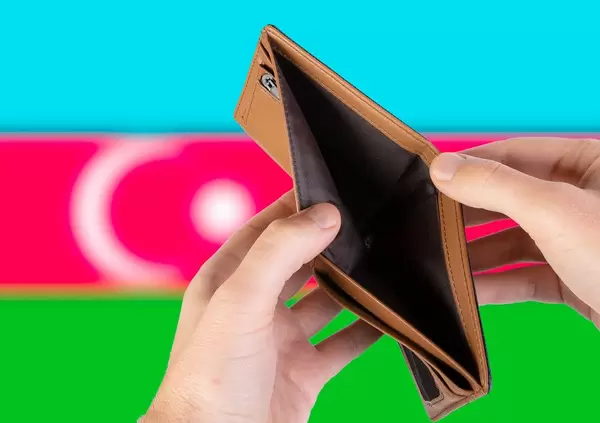 Empty Wallet with Flag of Azerbaijan. Recession and Financial Crisis to come with more debt and federal budget deficit?