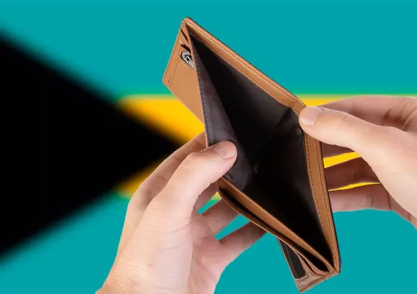Empty Wallet with Flag of Bahamas. Recession and Financial Crisis to come with more debt and federal budget deficit?