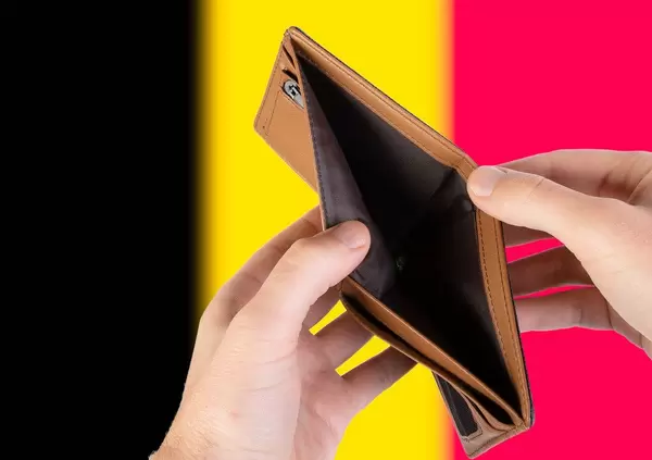 Empty Wallet with Flag of Belgium. Recession and Financial Crisis to come with more debt and federal budget deficit?