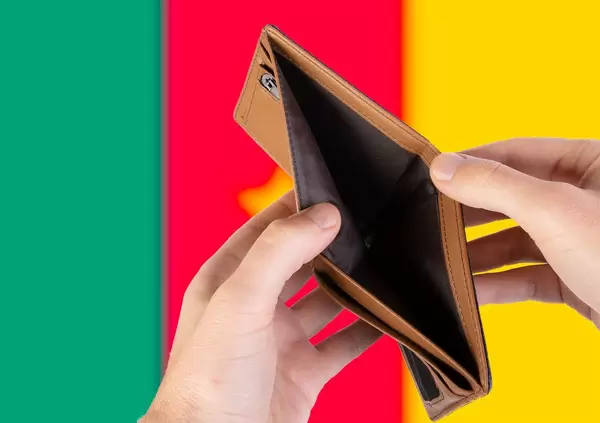Empty Wallet with Flag of Cameroon. Recession and Financial Crisis to come with more debt and federal budget deficit?