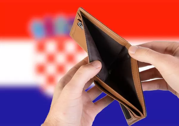 Empty Wallet with Flag of Croatia. Recession and Financial Crisis to come with more debt and federal budget deficit?