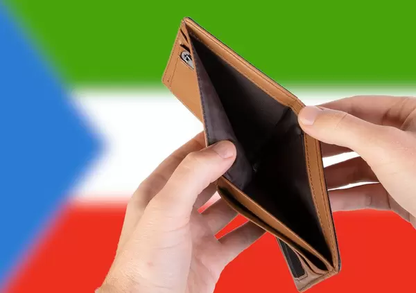 Empty Wallet with Flag of Equatorial Guinea. Recession and Financial Crisis to come with more debt and federal budget deficit?