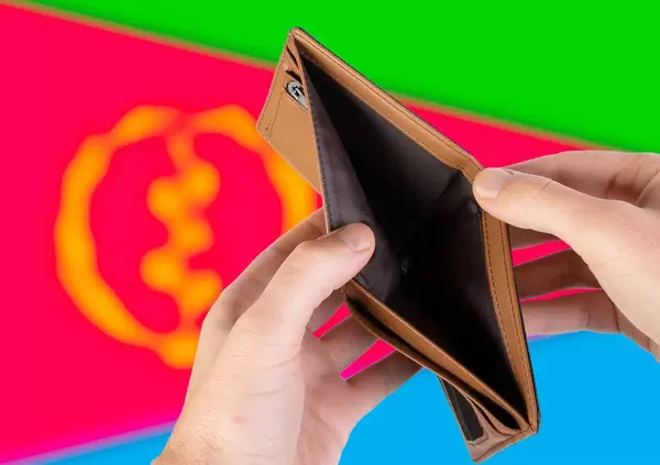 Empty Wallet with Flag of Eritrea. Recession and Financial Crisis to come with more debt and federal budget deficit?