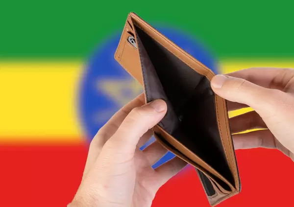 Empty Wallet with Flag of Ethiopia. Recession and Financial Crisis to come with more debt and federal budget deficit?