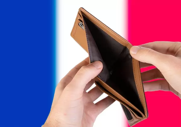 Empty Wallet with Flag of France. Recession and Financial Crisis to come with more debt and federal budget deficit?