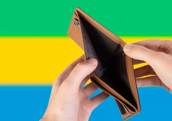 Empty Wallet with Flag of Gabon. Recession and Financial Crisis to come with more debt and federal budget deficit?