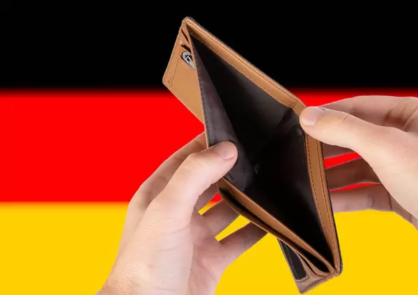 Empty Wallet with Flag of Germany. Recession and Financial Crisis to come with more debt and federal budget deficit?