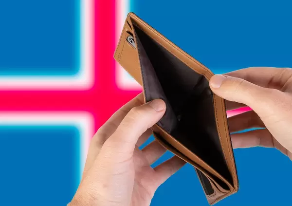 Empty Wallet with Flag of Iceland. Recession and Financial Crisis to come with more debt and federal budget deficit?