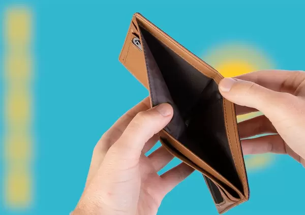 Empty Wallet with Flag of Kazakhstan. Recession and Financial Crisis to come with more debt and federal budget deficit?