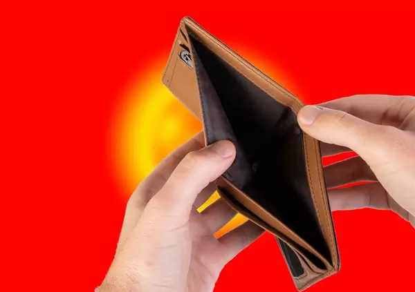 Empty Wallet with Flag of Kyrgyzstan. Recession and Financial Crisis to come with more debt and federal budget deficit?