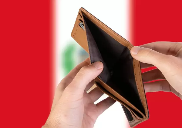 Empty Wallet with Flag of Peru. Recession and Financial Crisis to come with more debt and federal budget deficit?