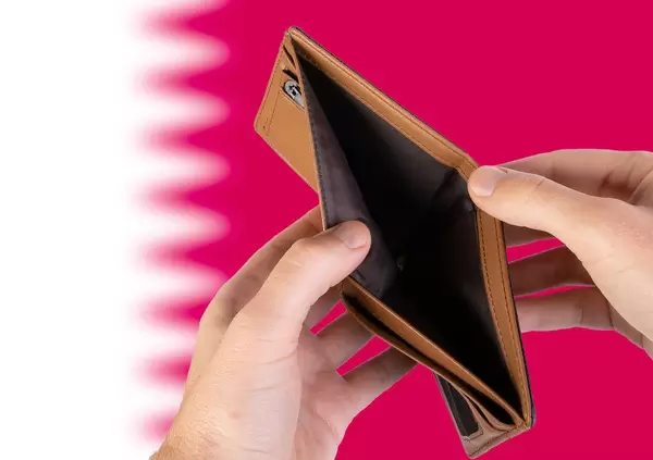 Empty Wallet with Flag of Qatar. Recession and Financial Crisis to come with more debt and federal budget deficit?