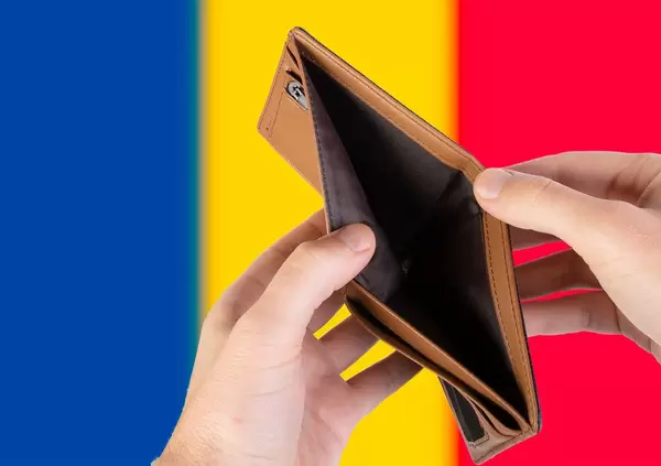 Empty Wallet with Flag of Romania. Recession and Financial Crisis to come with more debt and federal budget deficit?