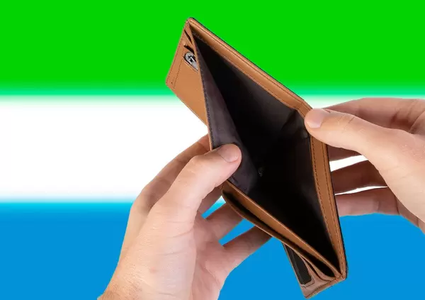 Empty Wallet with Flag of Sierra Leone. Recession and Financial Crisis to come with more debt and federal budget deficit?