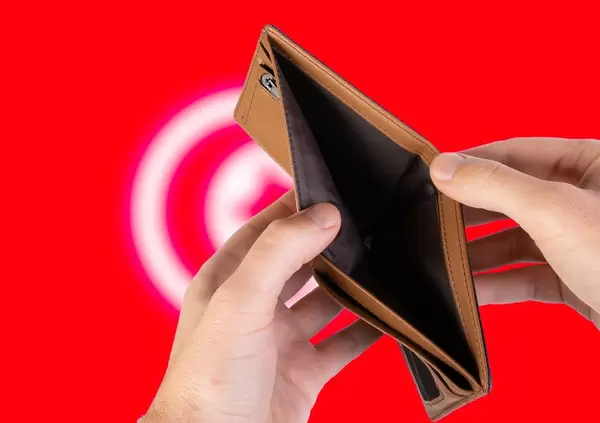 Empty Wallet with Flag of Tunisia. Recession and Financial Crisis to come with more debt and federal budget deficit?