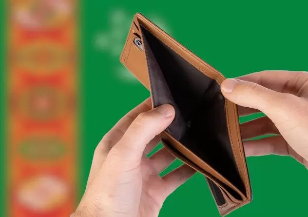 Empty Wallet with Flag of Turkmenistan. Recession and Financial Crisis to come with more debt and federal budget deficit?