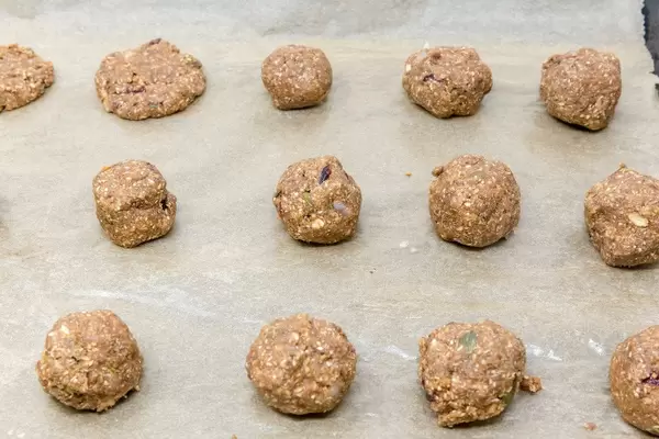 Energy Balls - Superfood Bakery - Glow Makers Cookies Dough Balls on baking paper