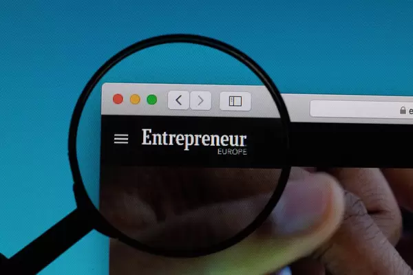 Enterpreneur logo under magnifying glass