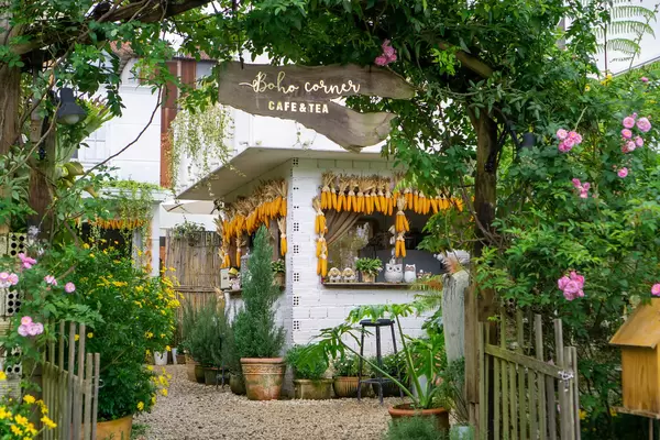 Entrance of a Cafe with many Plants and Flowers in Dalat, Vietnam