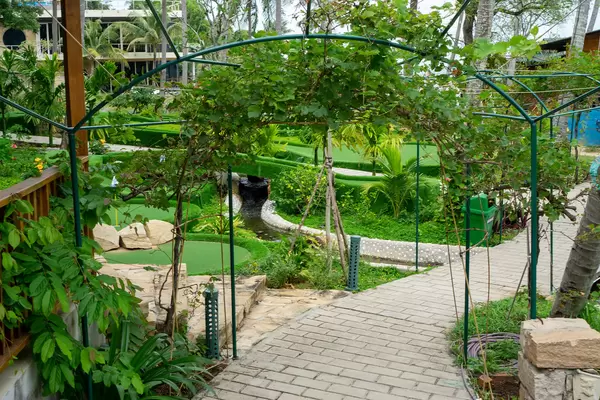 Entrance of Rory's Beach Club with Large Mini Golf Area and many Trees and Plants on Phu Quoc Island in Vietnam