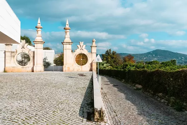 Entrance to Portuguese place with beautiful landscape in background (Flip 2019)